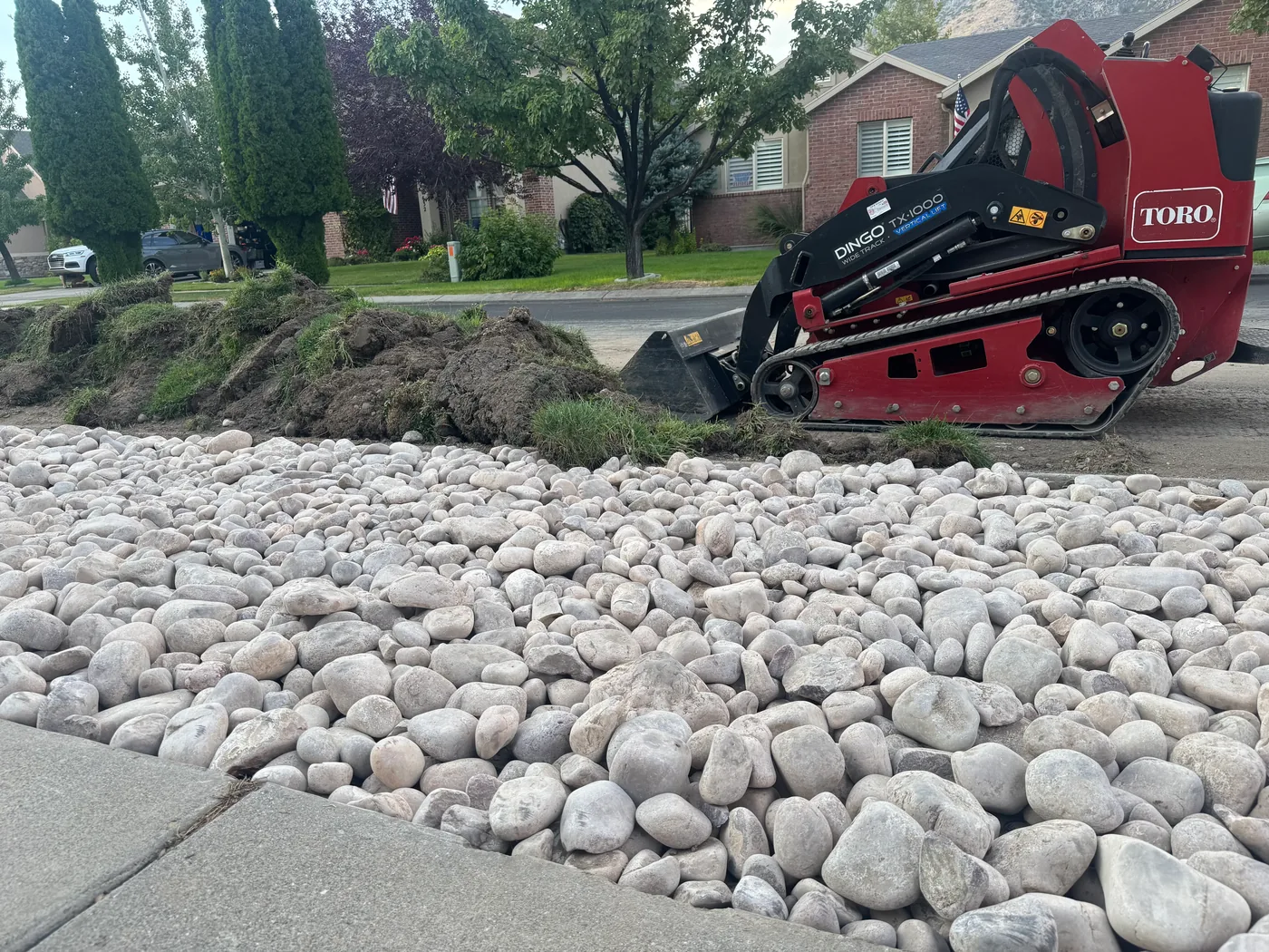 Cedar Hills strip flip completed — parking strip converted to gravel and weed barrier